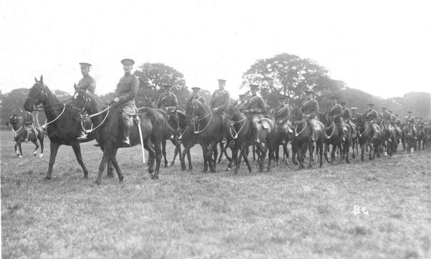 A troop of mounted cavalry in a park in Warwick.  1910s |  IMAGE LOCATION: (Warwickshire County Record Office)