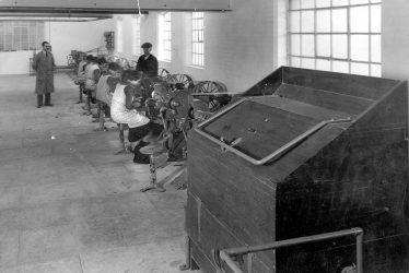 Bedworth.  Hat factory machinery and workers