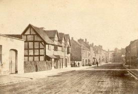Henley Street, Stratford upon Avon, with Shakespeare's birthplace on the left.  1864 |  IMAGE LOCATION: (Warwickshire County Record Office)