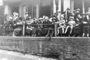 Warwick.  High Street, crowd waiting for Prince of Wales