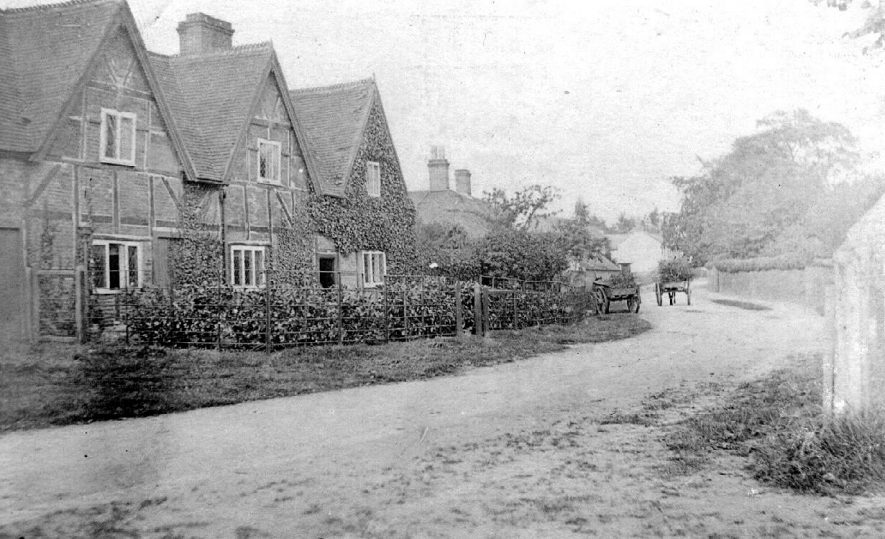 The Old Hall, horses and carts, Clifton upon Dunsmore.  1900s |  IMAGE LOCATION: (Warwickshire County Record Office)