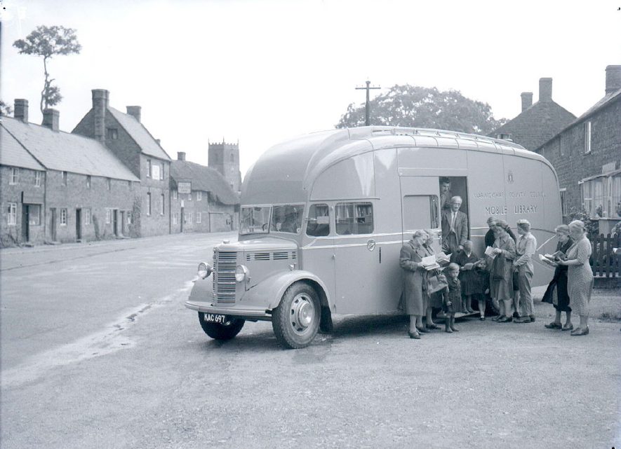 People standing outside the W.C.C mobile library van in Tysoe.  August 2nd 1950 |  IMAGE LOCATION: (Warwickshire County Record Office)
