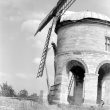 Chesterton.  Repairing the windmill sails