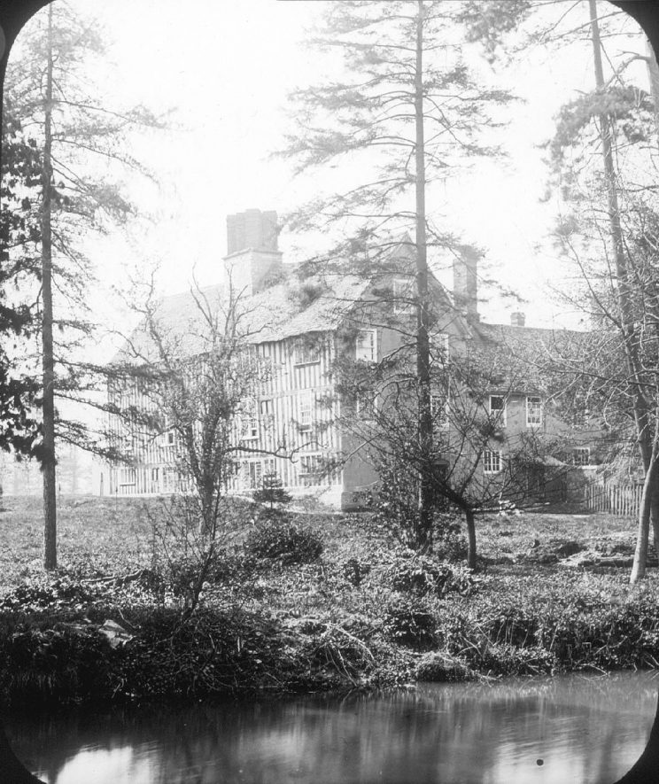 Rear of Manor House, Clifford Chambers, from across stream.  Timbered structure.  1900s |  IMAGE LOCATION: (Warwickshire County Record Office)