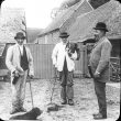 Clifford Chambers.  Men in a farmyard