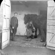 Clifford Chambers.  Blacksmith shoeing a horse