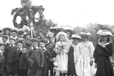 Clifford Chambers.  Village children dressed for May Day