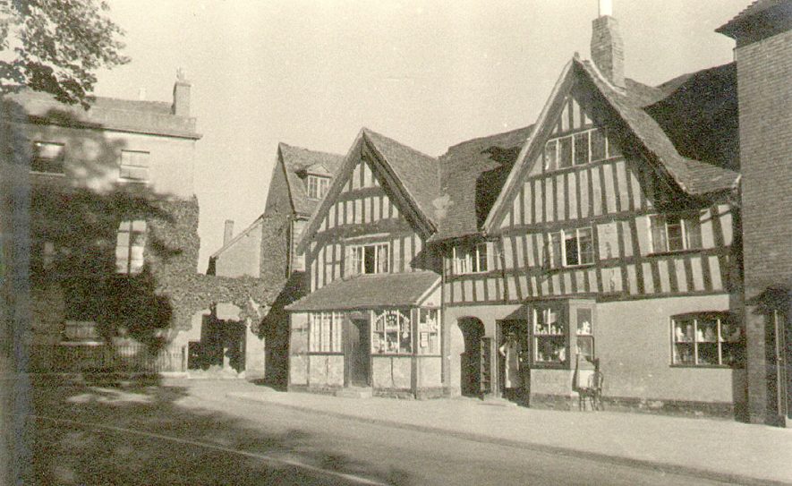 Half timbered shops in Church Street, Alcester.  1938. |  IMAGE LOCATION: (Warwickshire County Record Office)