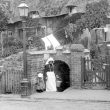 Cubbington.  Mrs Wells at the village pump