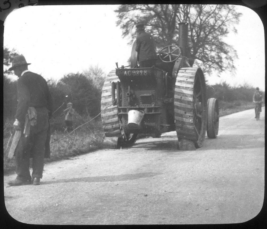 Traction engine pulling up hedges in the Coventry Road, Cubbington.  1920s |  IMAGE LOCATION: (Warwickshire County Record Office)