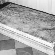 Grendon.  Church, grave slab inside Church