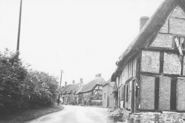 Hampton Lucy.  Timbered and thatched cottages