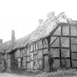 Hampton Lucy.  Thatched and timbered cottages