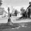 Harbury.  War memorial and Crown Inn