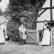 Hampton Lucy.  Group of People outside Avon Cottage