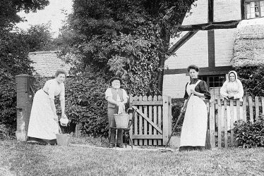 Hampton Lucy.  Group of People outside Avon Cottage