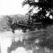 Hampton Lucy.  Horse and cart in floods in Charlecote Road