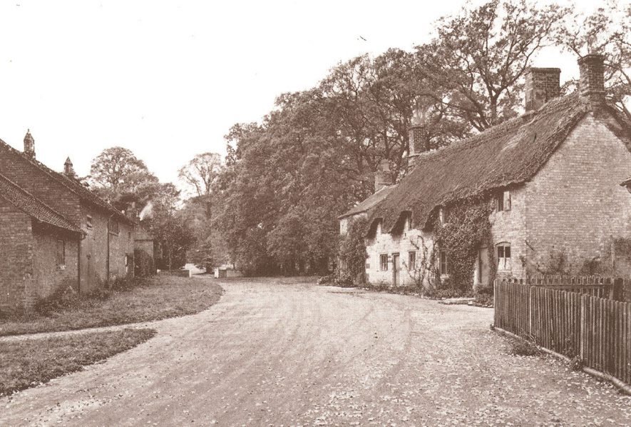Thatched cottages and village street, Idlicote.  1942 |  IMAGE LOCATION: (Warwickshire County Record Office)
