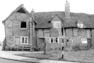Kenilworth.  Derelict cottages on Castle Green