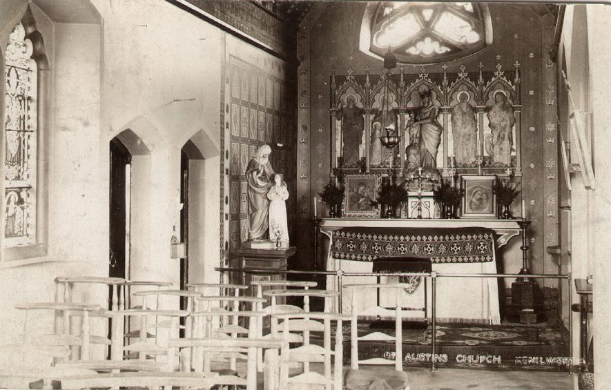Interior of St Austin's Roman Catholic church, showing the altar.  1900s |  IMAGE LOCATION: (Warwickshire County Record Office)