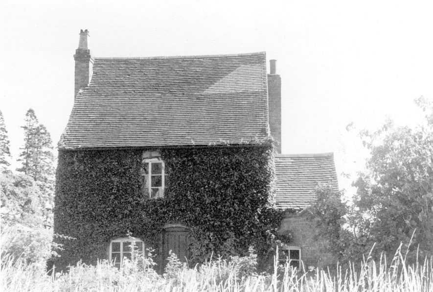 Small cottage clad in ivy and known as Ivy Cottage, Preston Fields, Preston Bagot.  1964 |  IMAGE LOCATION: (Warwickshire County Record Office)