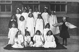 Stockingford council school photograph of a group of girls in fancy dress.  1920s |  IMAGE LOCATION: (Warwickshire County Record Office)