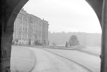 Stoneleigh.  Abbey viewed through an archway