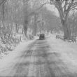Exhall, nr Alcester.  Country road under snow