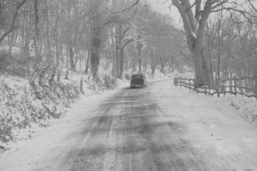 Exhall, nr Alcester.  Country road under snow