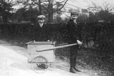Fillongley.  Two boys with hand-cart