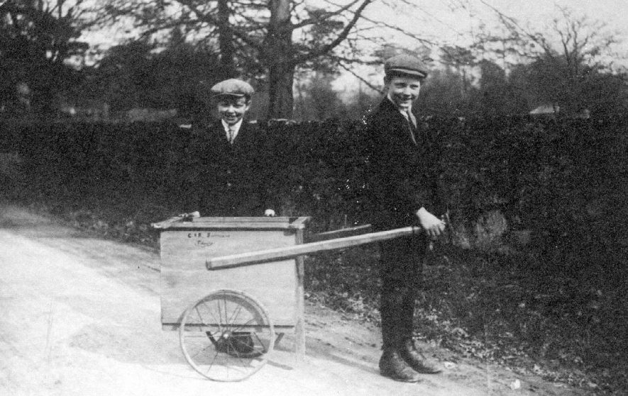 Fillongley. Two boys with handcart Our Warwickshire