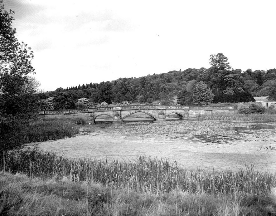 Walton Hall Park.  A bridge over the lake formed from the River Dene. |  IMAGE LOCATION: (Warwickshire County Record Office)