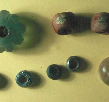 Glass beads found during the excavation of an Anglo Saxon cemetery at Bidford on Avon | Warwickshire County Council