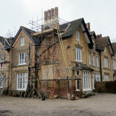 l-shaped, 3-storey buff building with tiled roof; some 'gothick' features; currently partly in scaffolding | Image courtesy of Anne Langley
