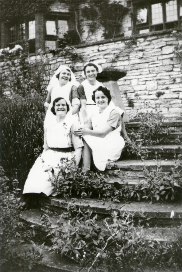 Nurses on Steps at Avonside, 1940. Taken by an uncle at the time I was born. My Aunt was a midwife sent to Avonside at the beginning of the war, when it was temporarily used as a nursing home for evacuee pregnant mothers. | Image courtesy of Diane Sparkes