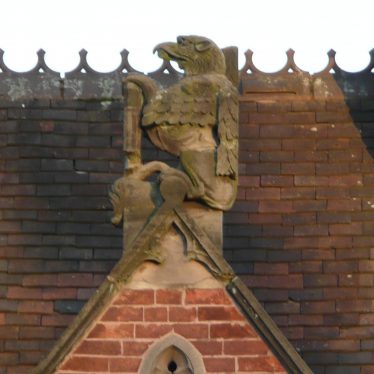Close up of stone figure on almshouse archway | Image courtesy of William Arnold