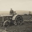 Long Compton. A Tractor and Plough in a Field at Yerdley Farm