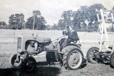 Bickmarsh. Sam Lynes on the Allis Chalmers tractor at Bickmarsh Hall Farm.