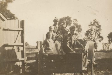 Ladbroke.  Family in Farm Cart