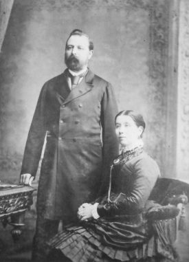 Photograph of Thomas Potterton and his wife, seated, 1880 | Photographer C. Hawkins. Potterton, Boiler Manufacturers collection, Warwickshire County Record Office reference CR4765/164