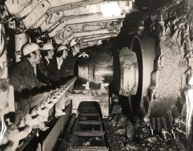 Men working underground in 64's District at Daw Mill Colliery, 1974. | Image courtesy of National Coal Board. Warwickshire County Record Office reference CR3418/369.