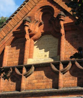 Stone plaque surrounded by fancy red brickwork | Image courtesy of Anne Langley