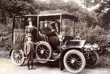 Leamington Spa.  Tom Herring driving landaulet