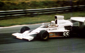 Mike Hailwood in his Yardley McLaren, 1974. | Originally uploaded to Wikipedia by Gillfoto