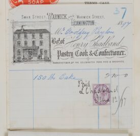 Invoice from Henry Chadband to Mrs Godfrey Payton for 150lbs of cake. The invoice is square of paper with a printed header. The printed text in the header is in a decorative style. It originally said there were shops in Warwick and Leamington. But Leamington has been crossed out by hand. There is a line drawn illustration of a brick building, three stories high. The top two stories have four windows. The ground floor has a shop window in the centre with H. Chadband over the top, and the number 12. Outside the building there is a couple and a child walking together and an open top carriage in the road. The carriage is being pulled by two horses. |  Warwickshire County Record Office reference CR1886/Box 927